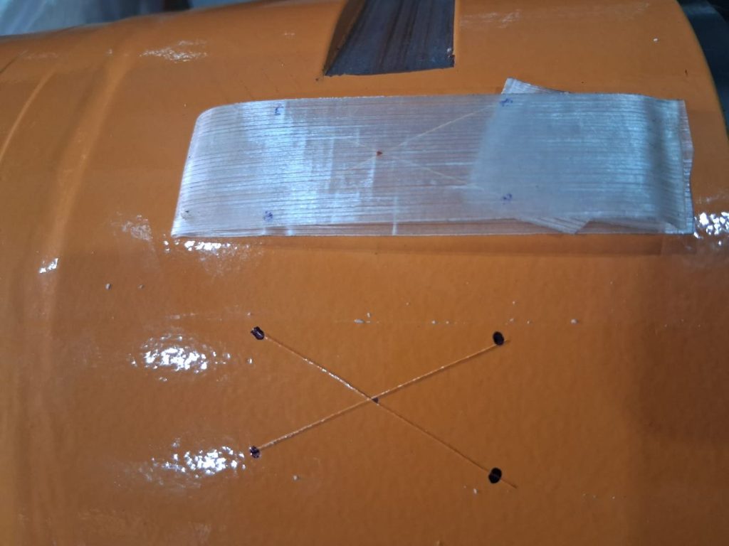 Teste de aderência de pintura industrial